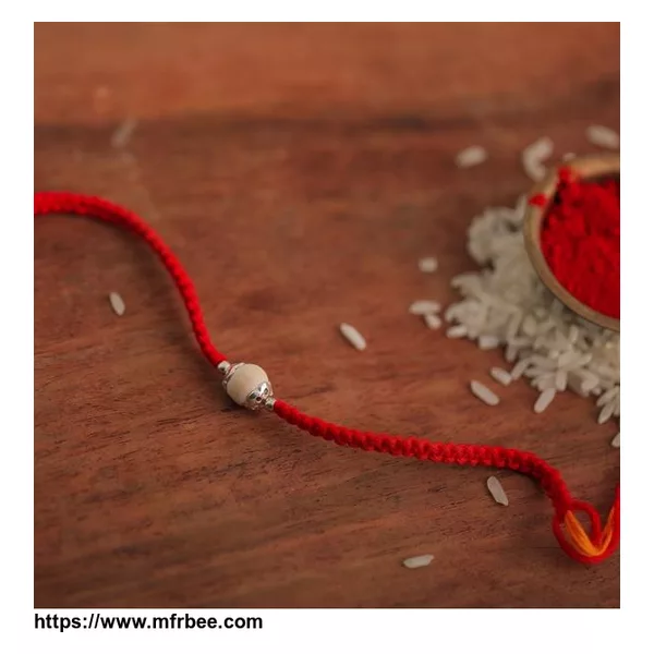 Singular White Bead Silver Rakhi